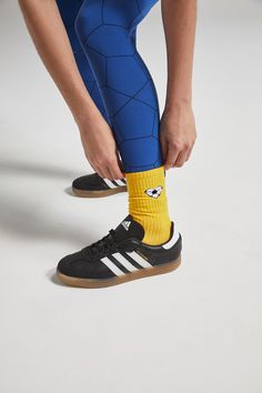 Meet the functional, foot-hugging sock you can feel good about. Carefully crafted with a bottom cushion for extra comfort, our Passion Crew socks are made from melange cotton for the perfect balance of soft and snug. Our pairs feature our new signature soccer heart icon. Comfortable enough to go socks-only, fitted enough to slip into any shoe and go, go, go. Sustainably made in the USA to support local jobs, proceeds support city-youth health via Ucal McKenzie Breakaway Foundation. Size chart:Small/MediumUS Sock Size Women 6 to 9US Sock Size Men 8 to 10Large/Extra LargeUS Sock Size Women 10-13US Sock Size Men 11-14 Soccer Heart, Soccer Love, Youth Empowerment, Heart Icon, Support Local, Black N Yellow, Crew Socks, Made In The Usa, Organic Cotton