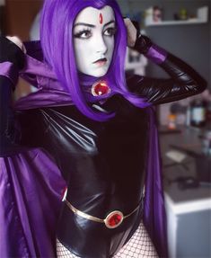 a woman with purple hair wearing a costume