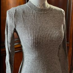 Grey Crew Neck Sweater. Very Stretchy! Fitted Gray Ribbed Sweater, Fitted Ribbed Gray Sweater, Gray Fitted Sweater For Work, Fitted Gray Sweater For Work, Fitted Gray Sweater For Spring, Fitted Ribbed Sweater, H&m Fitted Knit Sweater, H&m Stretch Tops For Winter, H&m Long Sleeve Tops For Fall