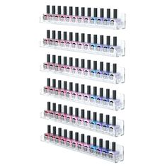 six bottles of nail polish are arranged on the wall