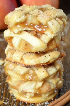 stack of apple pies with cinnamon on top