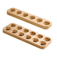 two wooden trays with holes in them