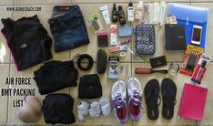 an assortment of items are laid out on the floor for someone to pack up their belongings