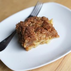 a piece of pie on a plate with a fork