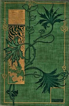 an old book with green and gold designs on it