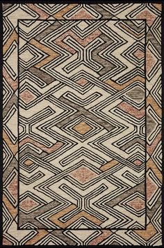 a rug with an abstract design on the front and back side, in black and beige colors