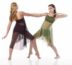 two young women are dancing together on a white background