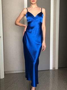 This silk satin slip dress can be worn as a bridesmaid dress, party and date dress and for many other occasions. Made of satin silk. DESCRİPTİON: -Adjustable straps. -Designed for a slim but relaxed fit. -Unlined. İt is a custom made dress, tailored according to your preferences, you can choose the length of the dress and order it with cut on the front. While ordering write your bust, waist and hips measure, so the dress will be made to your size. Please enquire if you're interested in different Silk V-neck Slip Dress For Prom, Fitted Satin Dress With Spaghetti Straps For Bridesmaid, Fitted Satin Bridesmaid Dress With Spaghetti Straps, Satin Midi Length Slip Dress For Evening, Elegant Satin Dress With Spaghetti Straps For Prom, Elegant Satin Spaghetti Strap Dress For Prom, Elegant Satin Spaghetti Strap Evening Dress, Elegant Spaghetti Strap Satin Dress For Prom, Fitted Blue Slip Dress For Prom