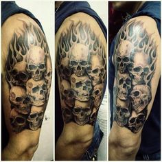 three different views of skulls with flames on their arms and shoulder, one is black and white