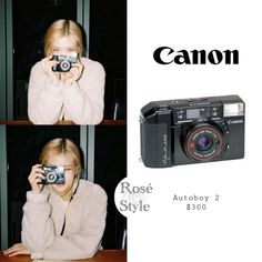 a woman holding up a camera in front of her face with the words canon on it