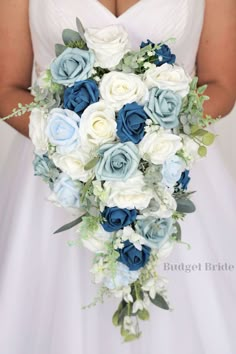 a bridal holding a blue and white bouquet