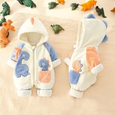 Newborn Rompers Baby Bodysuits - Thick and Plush Jumpsuit 2024 | Autumn & Winter Baby Jumpsuit | Cozy Outdoor Wear | Perfect Baby Gift 🌟  Introducing the ultimate in comfort and style for your little one! Our Newborn Rompers Baby Bodysuits are designed with love and care to keep your baby cozy and warm during the chilly autumn and winter months. 💖  Crafted from premium thick and plush materials, this jumpsuit is perfect for outdoor wear, ensuring your baby stays snug and protected. The soft, b Cute Winter Onesie With Cartoon Print, Cute Cartoon Print Onesie For Winter, Cute White Onesie For Winter, Cute White Winter Onesie, Cute Blue Winter Onesie, Cute White Hooded Onesie, Cute White Outerwear With Cartoon Print, Cute Light Blue Onesie For Playtime, White Winter Playwear For Babies