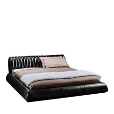 a bed that is made up with black leather and white fur on the headboard