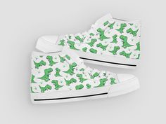 These cute green dinosaur shoes are sure to attrack some attention ! Our custom made shoes will make the best gift for any occasion! All of our sneakers are custom-made-to-order and handcrafted to the highest quality standards Check out more of our footwear here: https://www.etsy.com/shop/unicornshoesshop/ Product Name: Green Dinosaur Shoes | Dinosaur Sneakers | Cute Dinosaur Shoes, Custom High Tops Sneakers For Adults Women Men Girls & Boys Product Features; ▶ Full canvas double sided print Playful Green Sneakers With Rubber Sole, Playful Green Round Toe Sneakers, Dinosaur Sneakers, Cute Green Dinosaur, Dino Room, Dinosaur Shoes, Shoe Painting, Sneakers Cute, High Tops Sneakers