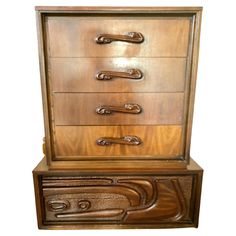 an old wooden dresser with drawers and handles