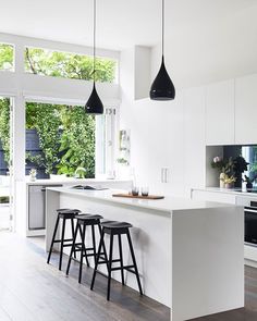 the kitchen is clean and ready to be used as a dining room or living room