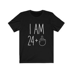 a black t - shirt with the words i am 24 plus and a hand cursive