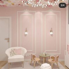 a baby's room decorated in pink and white with flowers painted on the ceiling