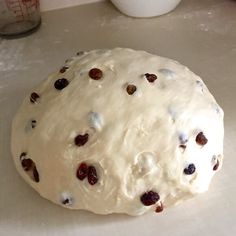 a doughnut sitting on top of a white counter