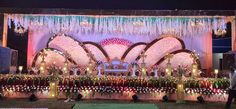 an elaborately decorated stage with lights and decorations