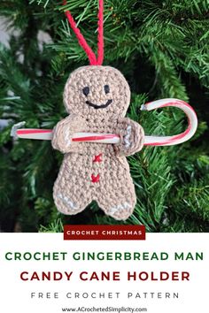 a crochet gingerbread man ornament hanging from a christmas tree with candy canes