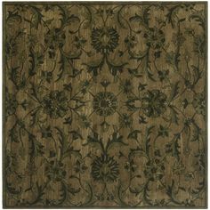 an area rug with flowers and vines on the side, in dark olive green tones