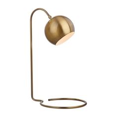 a brass colored lamp on a white background