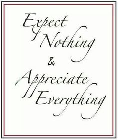 the words expect nothing and appreciate everything written in cursive ink on white paper