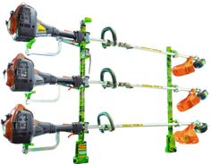 four different types of chainsaws attached to a pole with handles and hooks on each side