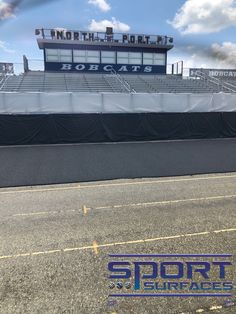 an empty football stadium with the words sports and services on it's sidelines