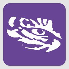 the eye of a tiger on a purple square sticker