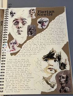 an open notebook with drawings and writing on the pages, including images of people's faces