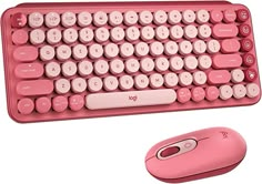 a pink computer keyboard and mouse on a white surface