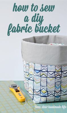 a sewing basket with the words how to sew a diy fabric bucket