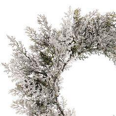 a white wreath with snow on it