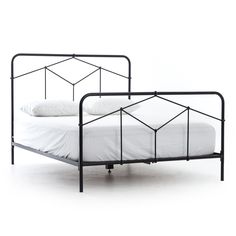 Resolutely modern, Four Hands furniture collection mixes materials and influences for a fresh, inspired look. Modern geometric patterns update a design inspired by vintage European hospital beds. Simple iron tubing looks airy and feels substantial. Twin size stunning when paired. Low-profile box spring recommended. Twin: 40.5"W x 78.5"D x 51"H, Queen: 61.5"W x 84"D x 51.5"H, King: 77.5"W x 83.5"D x 51"H Color: Sandblasted Vintage Black Material: Iron Please allow 2-4 weeks to ship Shop more Four Black Iron Bed, Black Iron Beds, Four Hands Furniture, Eagle Feather, 115 Lbs, Modern Room Decor, Bed Linen Design, Top Beds, Greenwich Ct