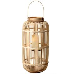 a light that is on top of a wicker lamp shade with a white background