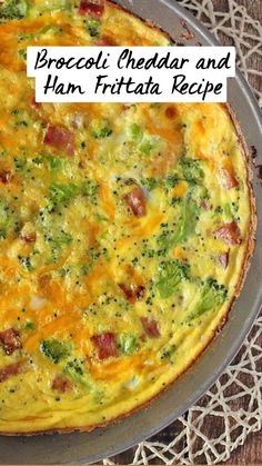 an omelet with broccoli and ham in a pan on a table