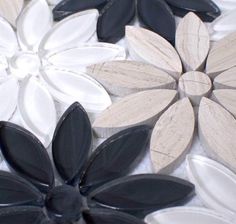 some black and white flowers on a table