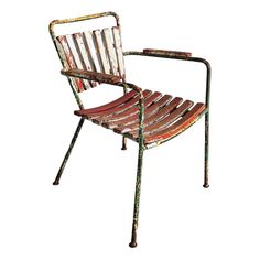 an old metal chair with wooden slats on the armrests and back rest