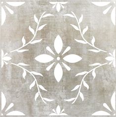 a white and gray rug with leaves on it