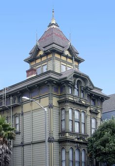 an old victorian style building with a clock tower