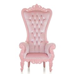 a pink chair with an ornate design on the back and arms, sitting in front of a white background