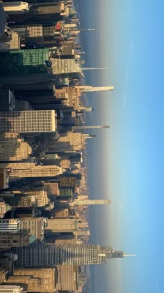 an aerial view of some very tall buildings