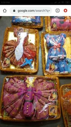 six plastic bags filled with different types of hair accessories on top of a table next to each other