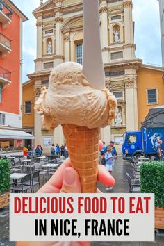 someone holding up an ice cream cone with the words delicious food to eat in nice, france