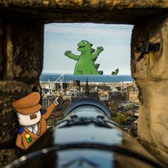 an image of a dinosaur looking through a hole in a wall with the city below