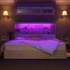 a bed with purple lights in a room