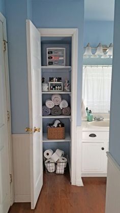 the bathroom is clean and ready to be used as a storage area for toiletries