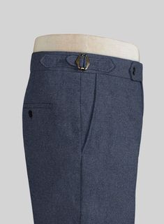 A genuine sartorial masterpiece, the Playman Blue Denim Highland Tweed Trousers stand out in the best way possible with its luxurious feel and solid flair. Crafted from wool, the sumptuous trousers will wow the crowd at off-duty weddings and party events. 
 
 Look Includes  Playman Blue Denim Tweed Fabric  Cross Pocket  Forward 2 Pleats  Side Tabs (No Loops)- Arrow Shape   Bottom Cuff (1.5")  Two Welted Back Pockets on Trousers   You can change the look during customization if required. 
 
 Lini Elegant Fitted Tweed Bottoms, Blue Wool Bottoms With Welt Pockets, Formal Blue Wool Bottoms, Wool Dress Pants With Belt Loops For Semi-formal Events, Wool Dress Pants With Belt Loops For Semi-formal Occasions, Elegant Blue Wool Bottoms, Elegant Tweed Pants For Business, Elegant Tweed Bottoms For Business, Tailored Blue Wool Bottoms